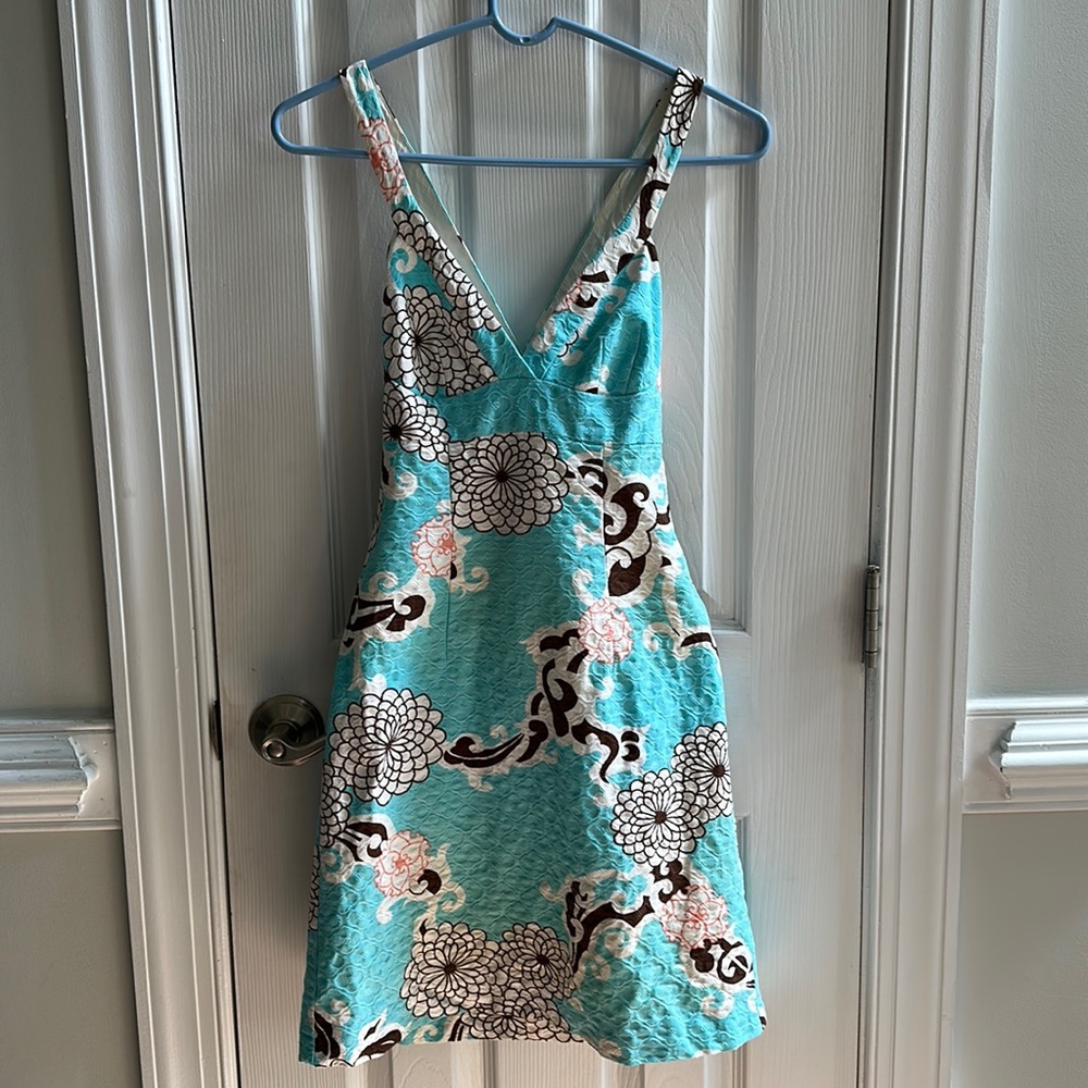 Trina Turk sundress in fun floral pattern. Criss cross back. Size 0
